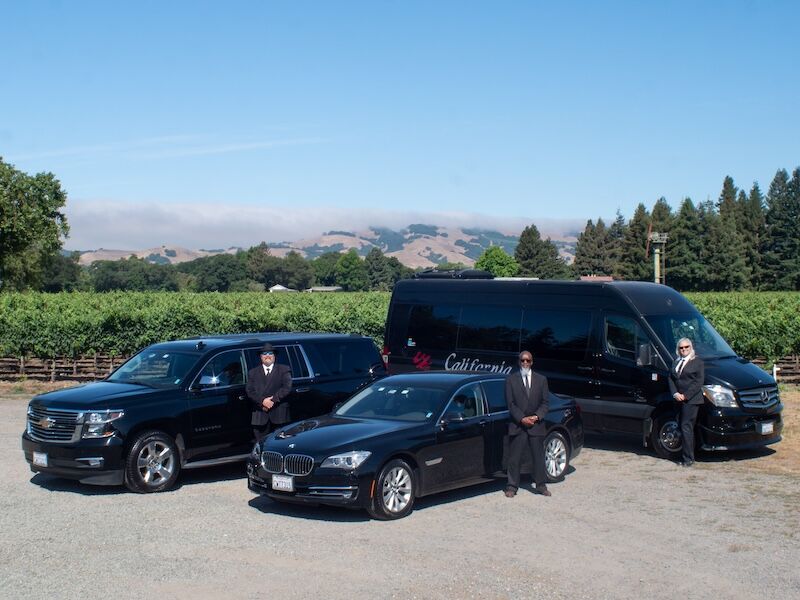 California Wine Tours chauffeurs with luxury sedan, SUV, and sprinter van offering corporate transportation in Napa Valley.